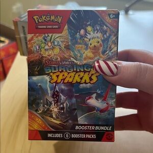 Pokemon Scarlet & Violet Surging Sparks Booster Bundle - Red, Yellow, Blue